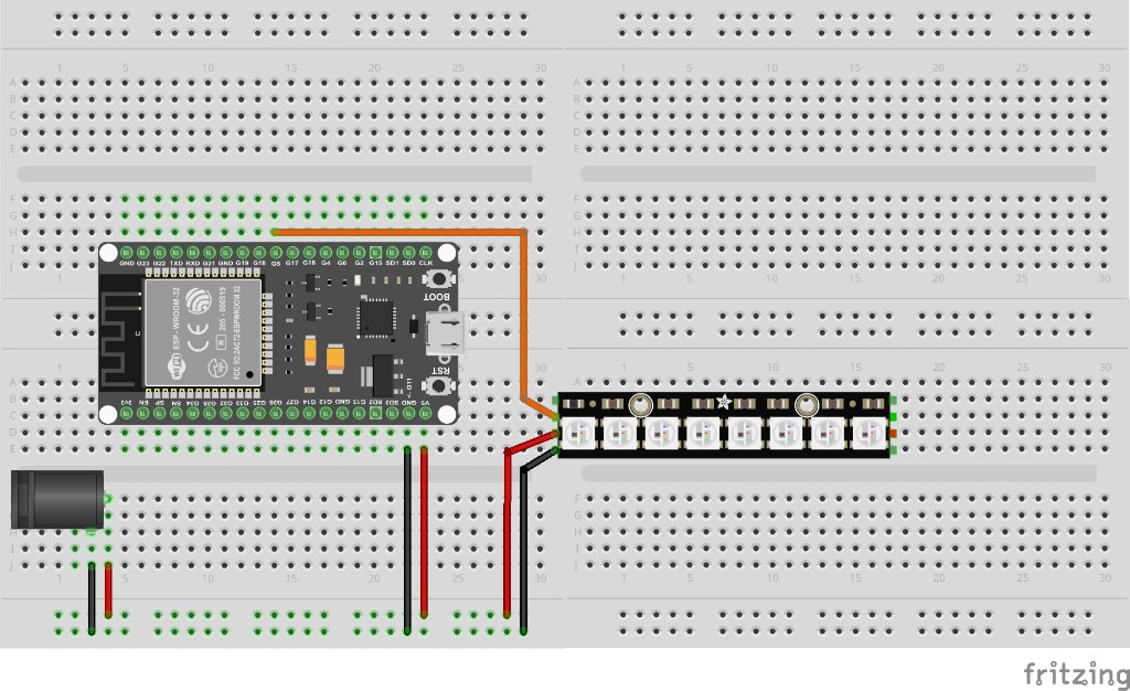 Breadboard layout for ESP32 NeoPixel with external 5 V DC supply, GPIO 5 data and common GND